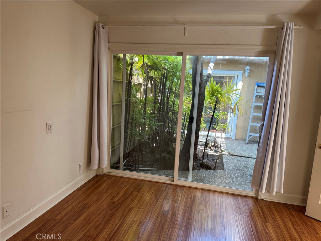 39 Bethany Drive Irvine, CA 92603 - Photo 24 of 37 a view of a room with wooden floor and outdoor view