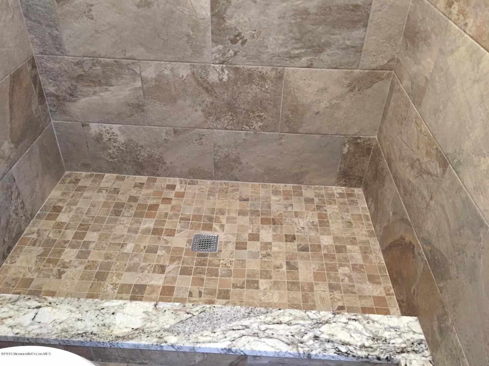 521 Burlington Road Freehold, NJ 07728 - Photo 6 of 13 a bathroom with a shower