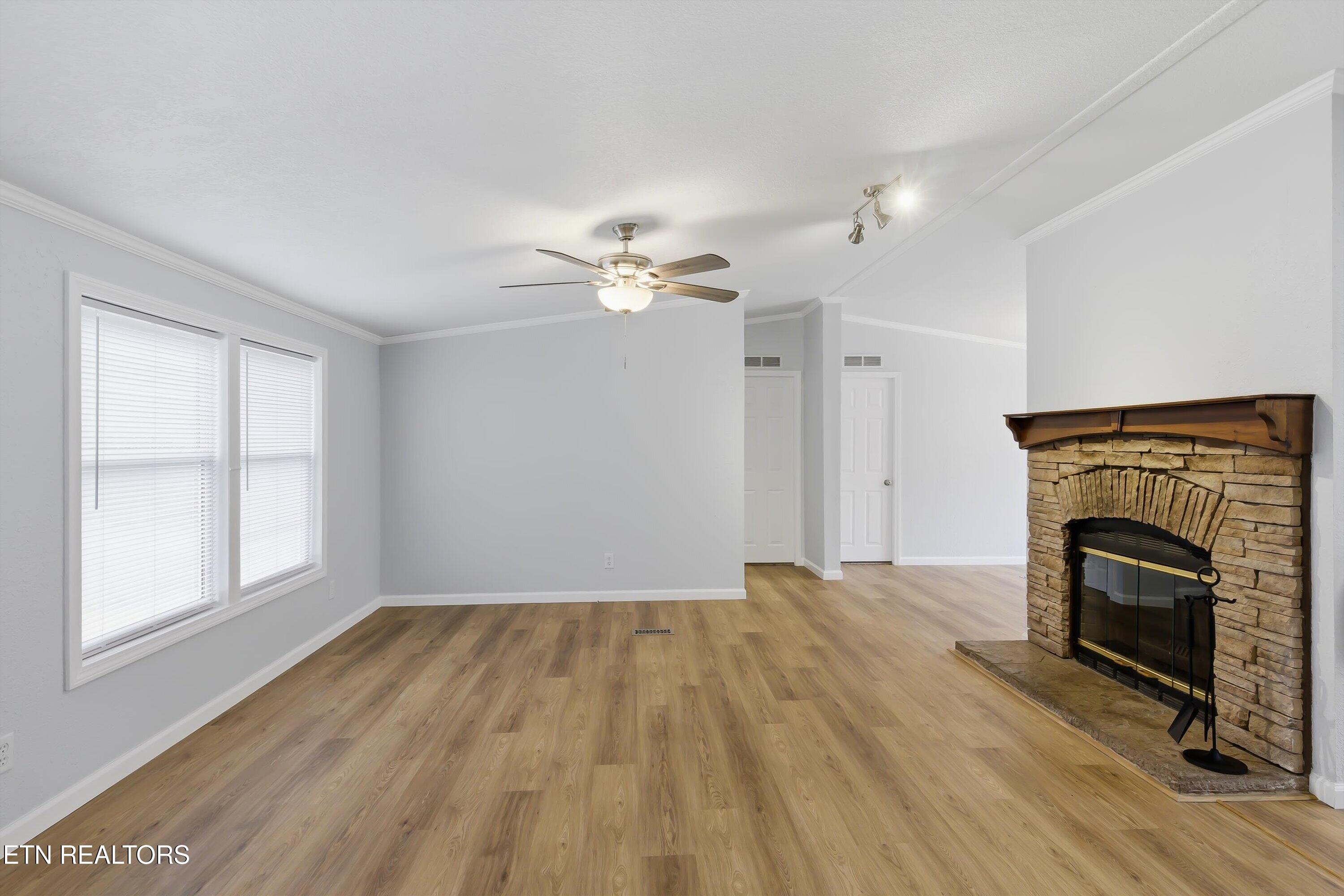 2214 Hinds Creek Road Heiskell, TN 37754 - Photo 4 of 39 Living Room with Fireplace