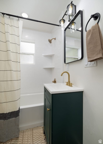 479 South 100 West Vernal, UT 84078 - Photo 8 of 13 Bathroom featuring vanity and shower / bath combo with shower curtain