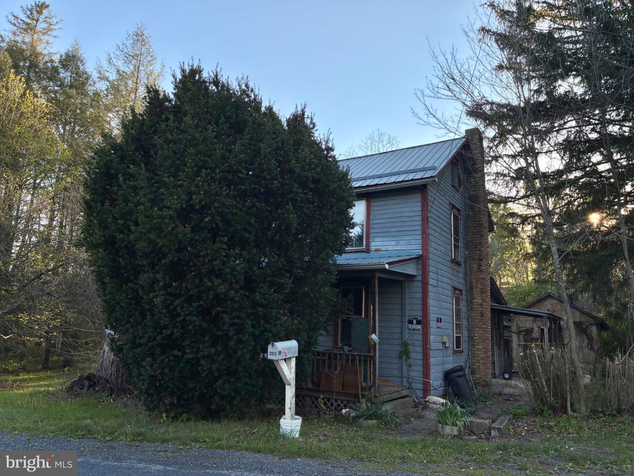 201 Hoover Road Robertsdale, PA 16674 - Photo 3 of 22 Charming home nestled in nature's embrace.