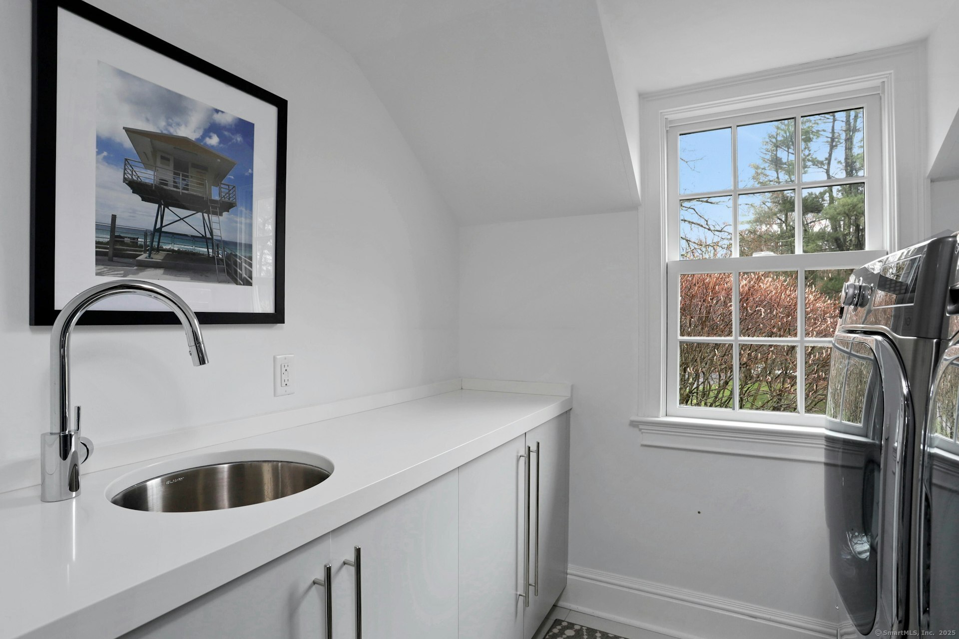 75 Hanson Road Darien, CT 06820 - Photo 25 of 30 a bathroom with a sink and a window