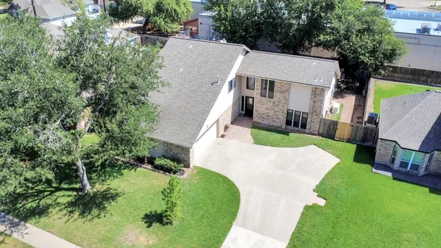 an aerial view of houses and roads