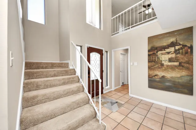 a view of an entryway with staircase