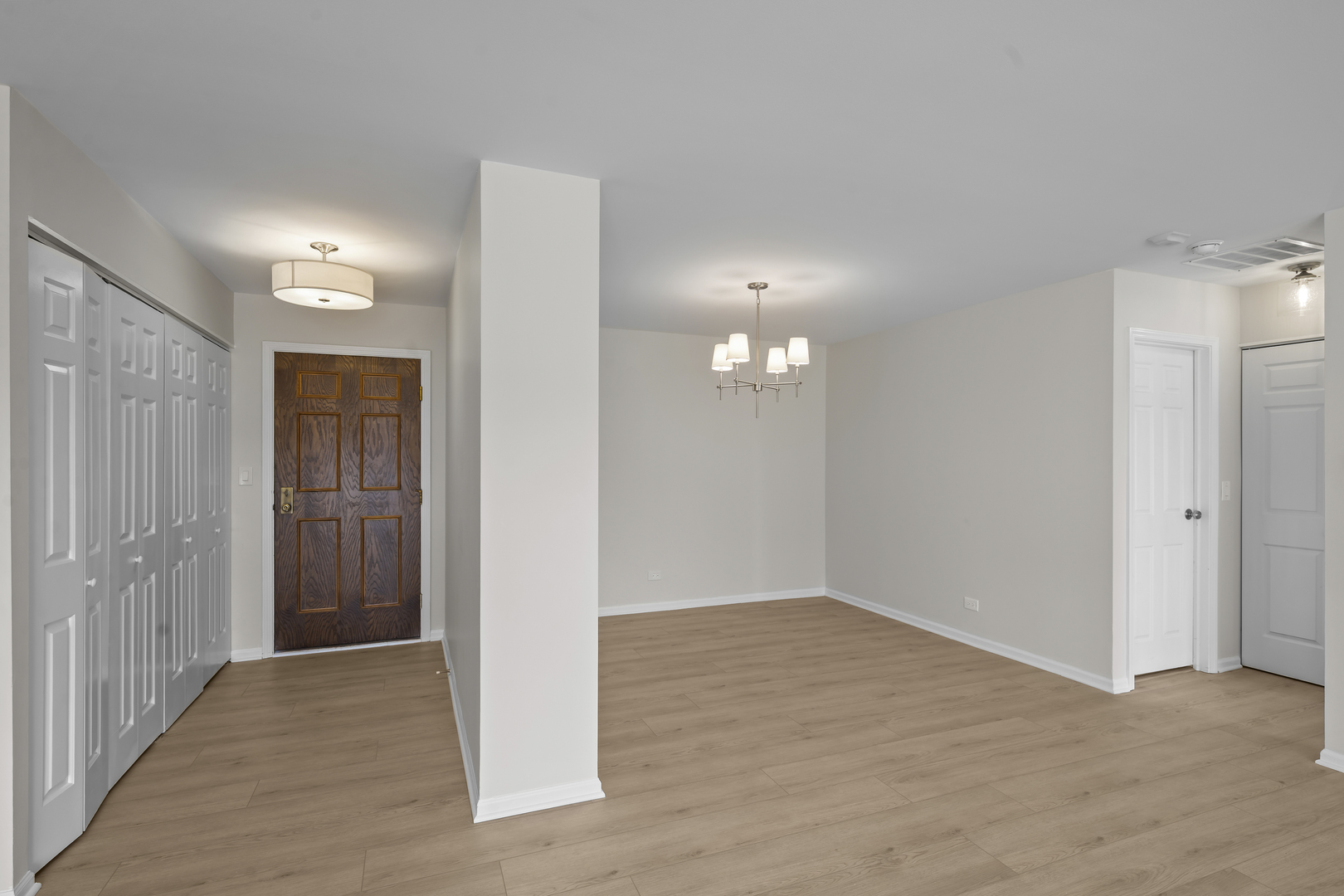 1250 Rudolph Drive, Unit 4F Northbrook, IL 60062 - Photo 6 of 15 wooden floor in an empty room