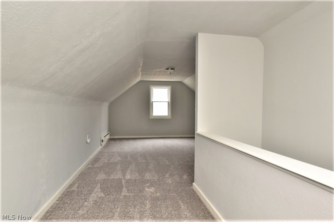 21012 Hansen Road Maple Heights, OH 44137 - Photo 20 of 28 Upstairs hallway leads to a large bedroom