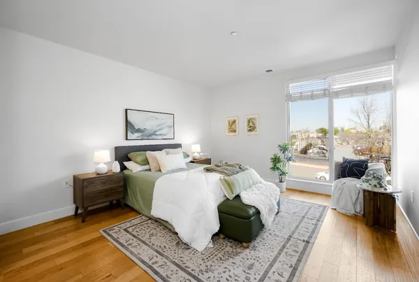 a bed room with a bed and a couch