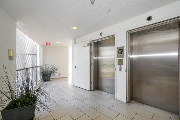a bathroom with a shower and a shower
