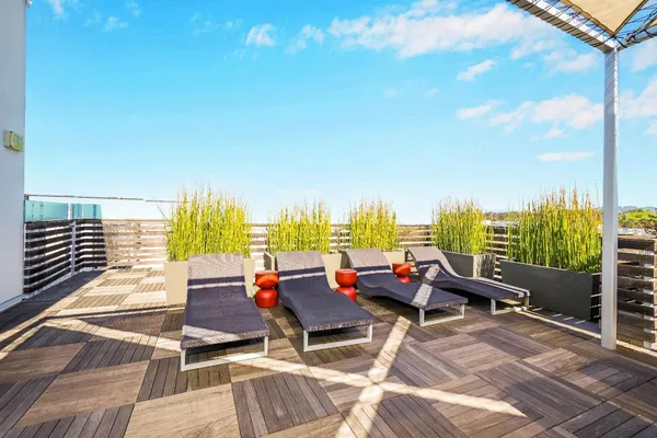 a roof deck with patio