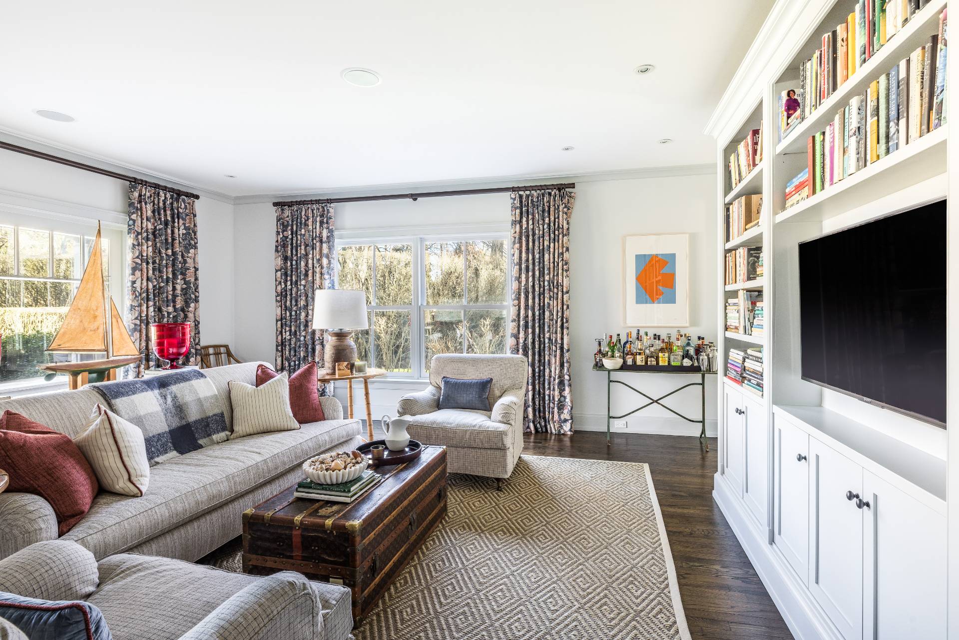 2654 Montauk Highway Bridgehampton, NY 11932 - Photo 5 of 19 a living room with furniture a flat screen tv and a floor to ceiling window