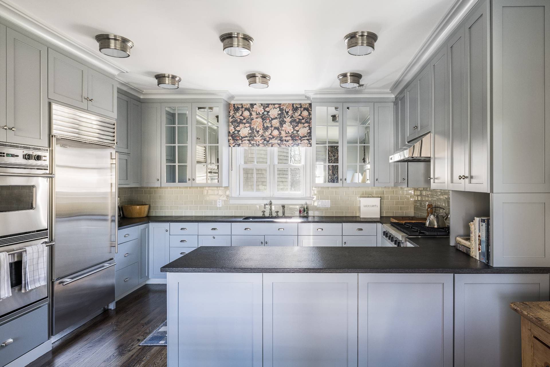 2654 Montauk Highway Bridgehampton, NY 11932 - Photo 7 of 19 a kitchen with a sink a counter top space cabinets and stainless steel appliances