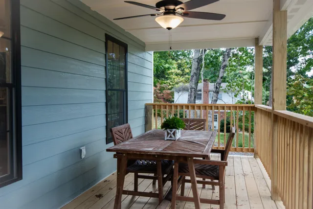 a view of a porch with furniture