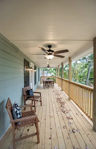 a view of a double vanity sink and a window in a room