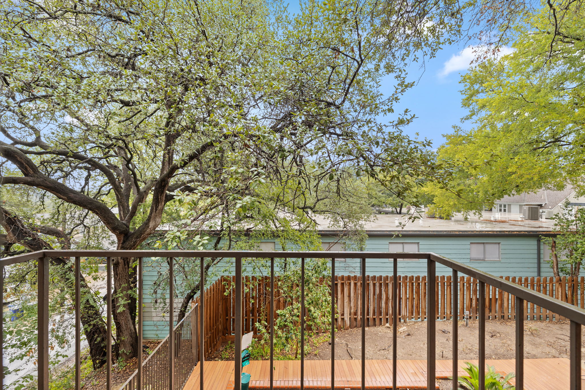 2706 Salado Street, Unit 210 Austin, TX 78705 - Photo 32 of 32 a view of a balcony with outdoor space