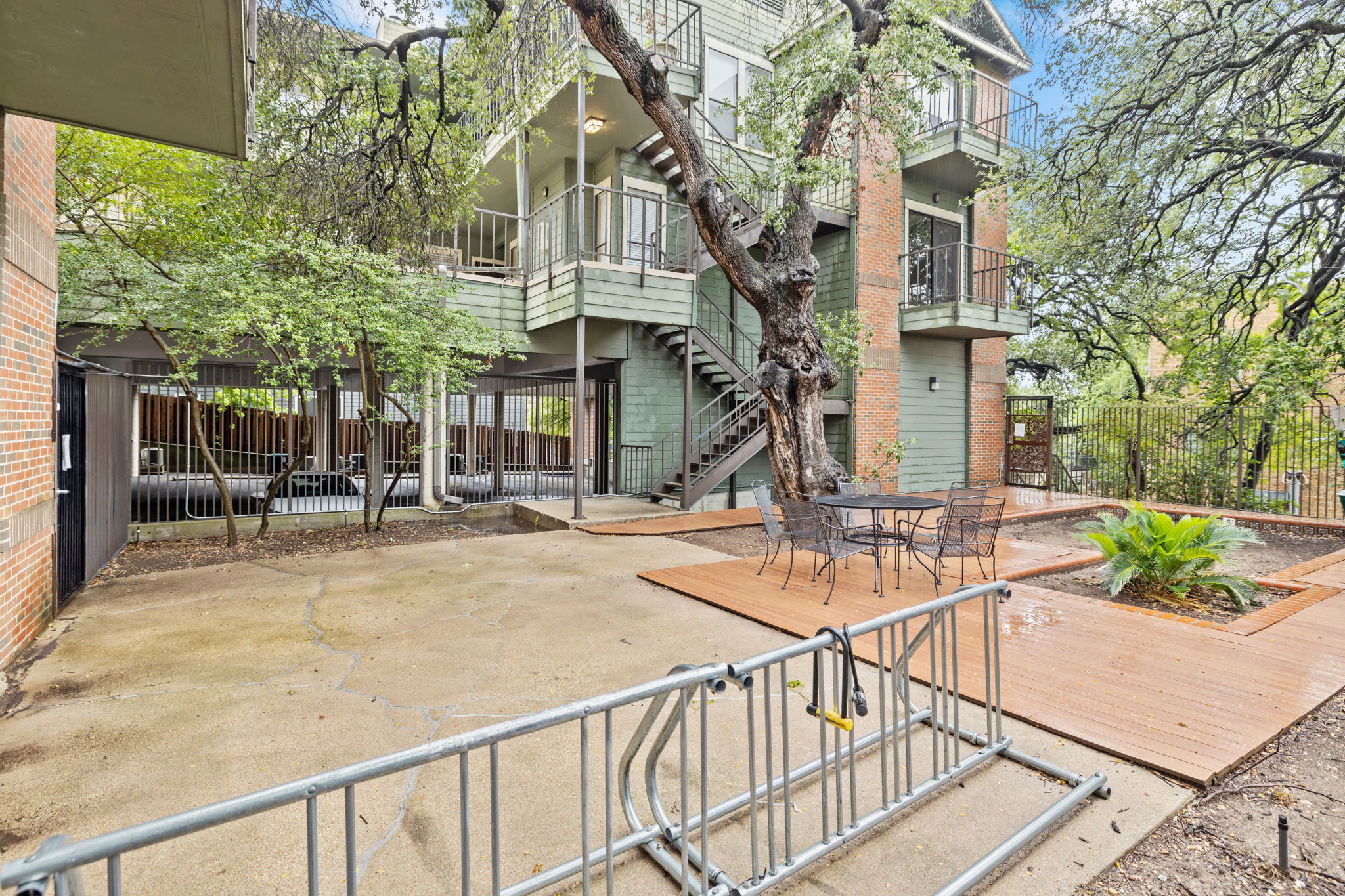 2706 Salado Street, Unit 210 Austin, TX 78705 - Photo 4 of 32 a view of a building with sitting area