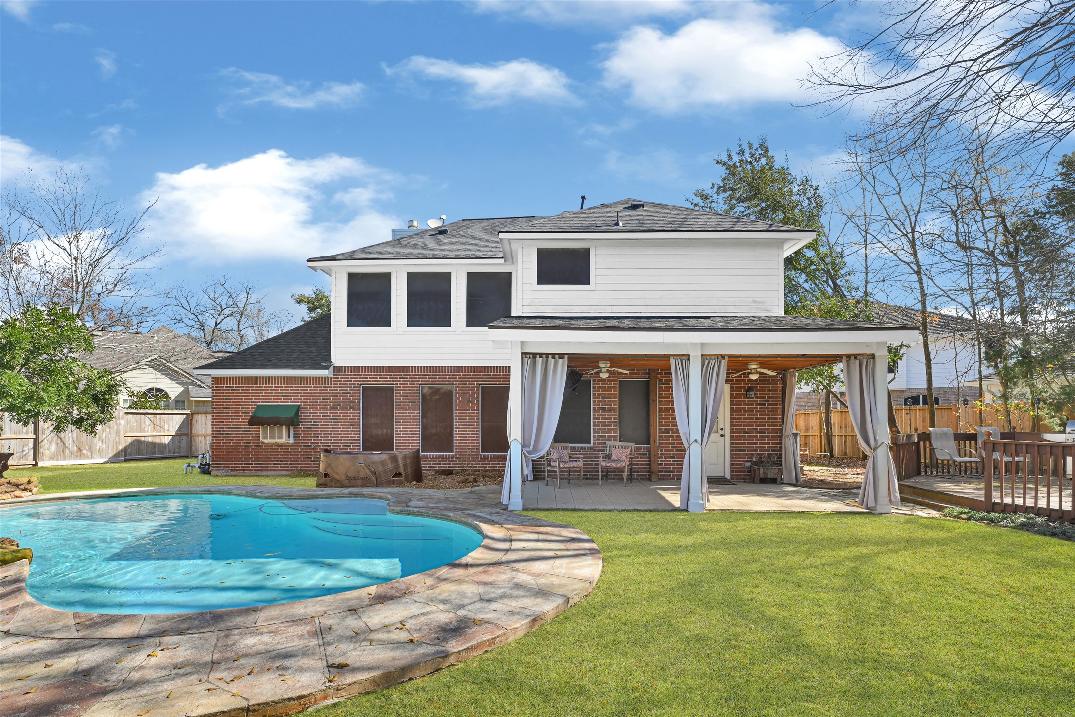 Large lot with extended yard space and pool