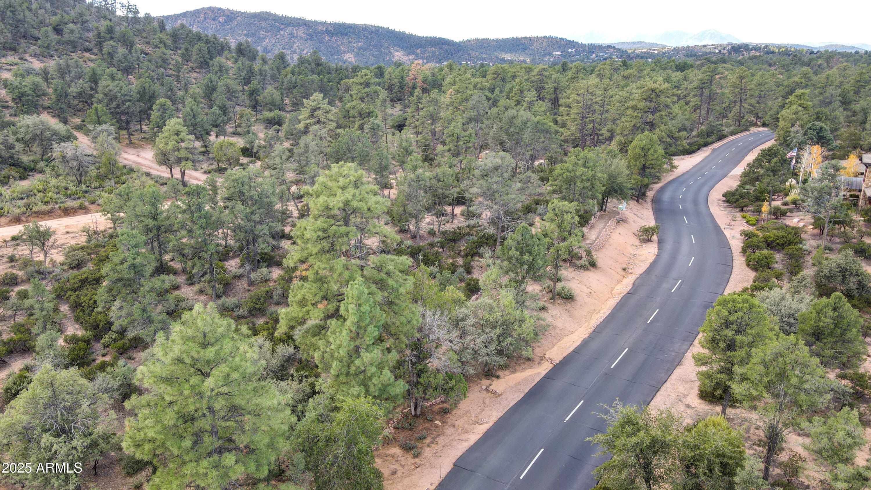 2201 East Rim Club Drive, Unit 98 Payson, AZ 85541 - Photo 12 of 13 a view of a house with a yard and mountain