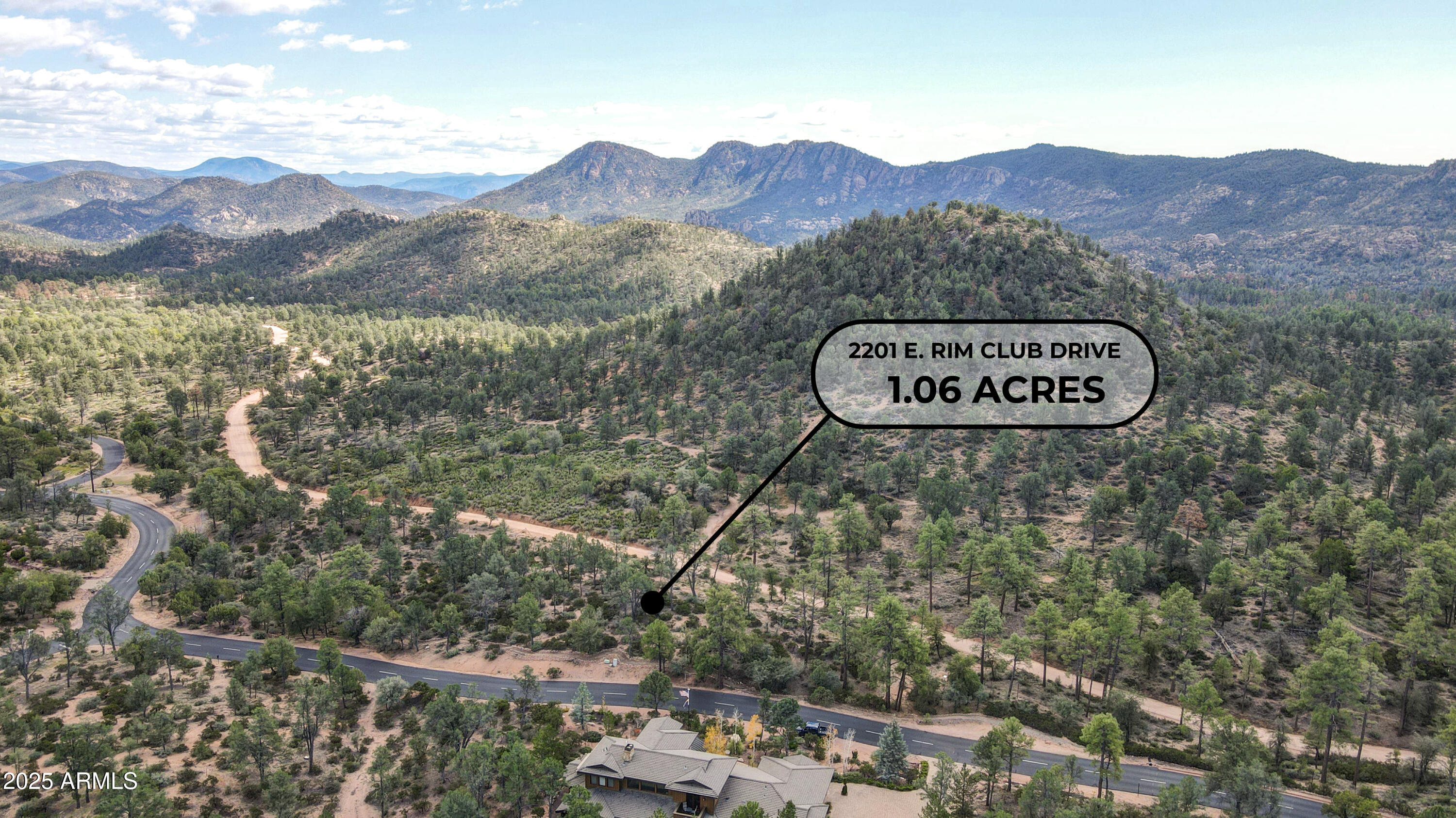 2201 East Rim Club Drive, Unit 98 Payson, AZ 85541 - Photo 7 of 13 a view of a street with a mountain in the background