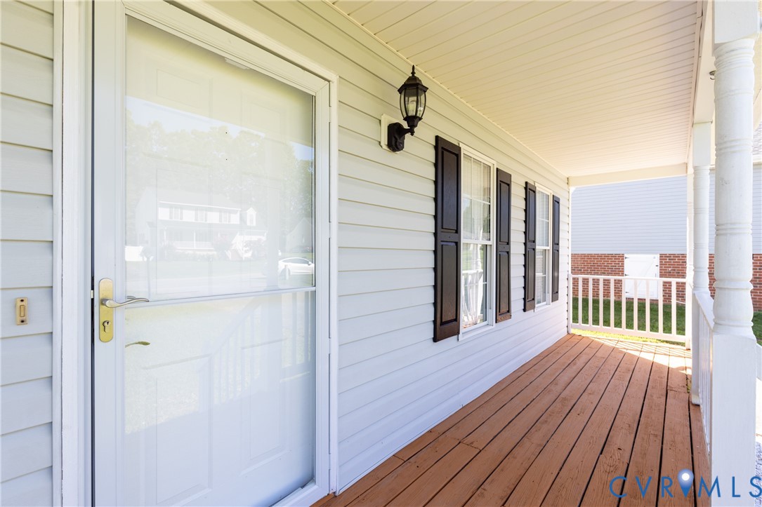 5101 Spring Bluff Road Midlothian, VA 23112 - Photo 5 of 47 Front porch with wood-finish flooring, white vinyl