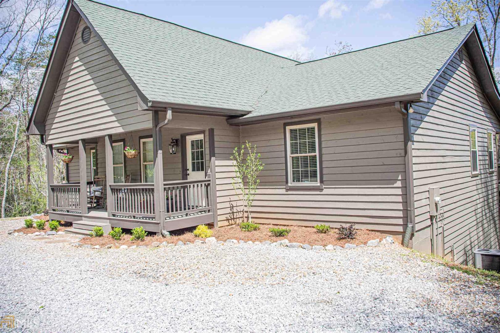136 Gold Ditch Road Cleveland, GA 30528 - Photo 1 of 1 a backyard of a house