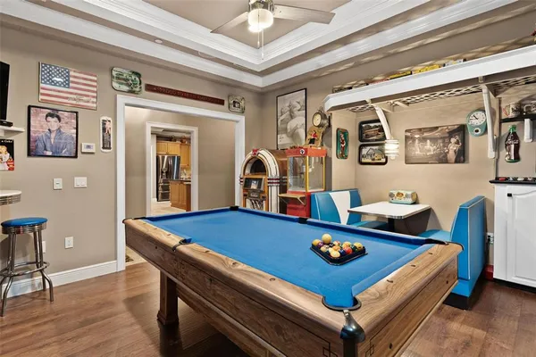 a living room with a fireplace and a large window