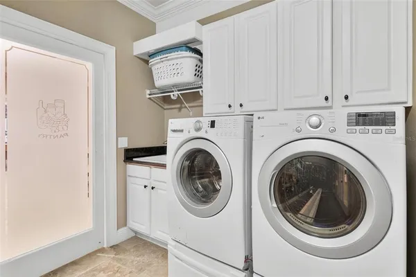 a bathroom with a granite countertop sink a mirror and a shower