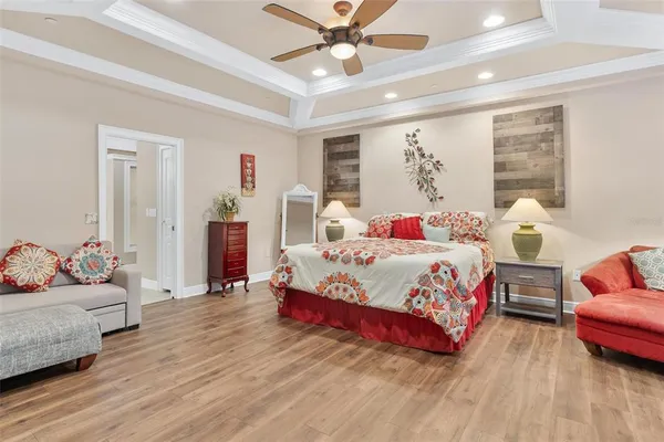 a bathroom with a granite countertop double vanity sink and a mirror