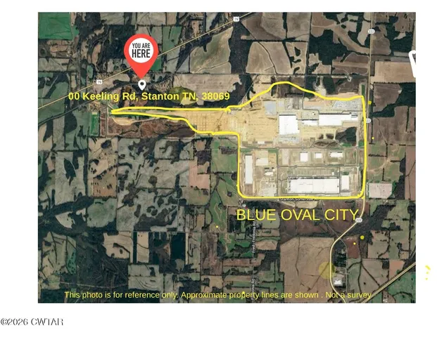 a bathroom with a granite countertop window and a sign