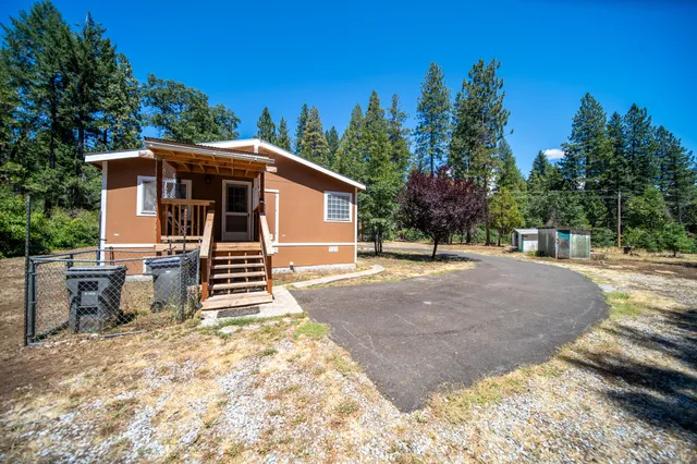 a front view of house with street