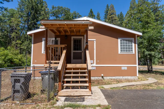 a view of backyard with green space