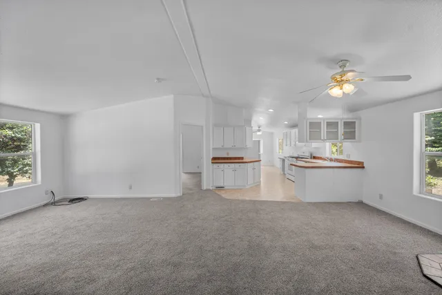 a view of a kitchen with furniture and window