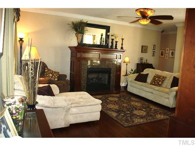 925 Quarterhorse Road Princeton, NC 27569 - Photo 6 of 21 FAMILY ROOM WITH STUNNING MANTEL WITH GRANITE SURROUND*GAS LOG FIREPLACE