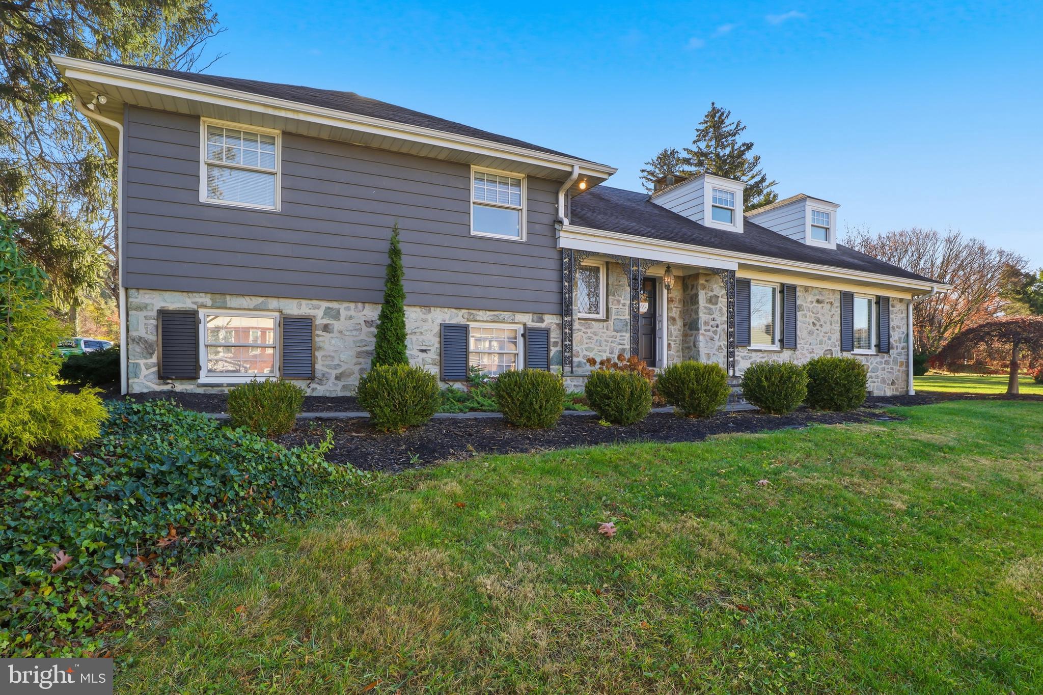 1000 Smallbrook Lane York, PA 17403 - Photo 4 of 84 a front view of a house with garden