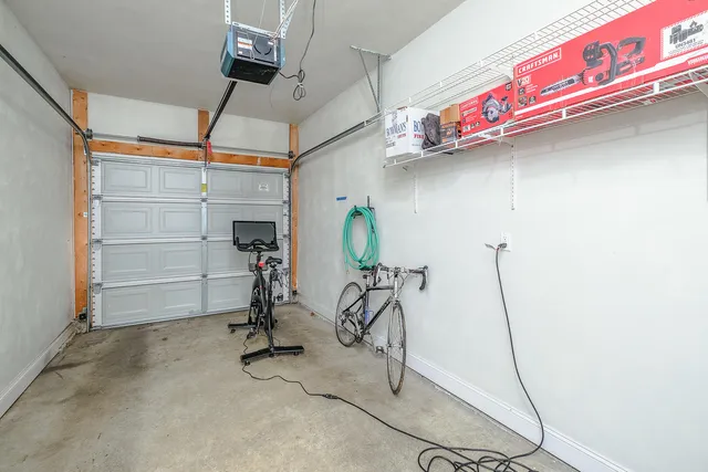 a kitchen with stainless steel appliances granite countertop a sink and a refrigerator