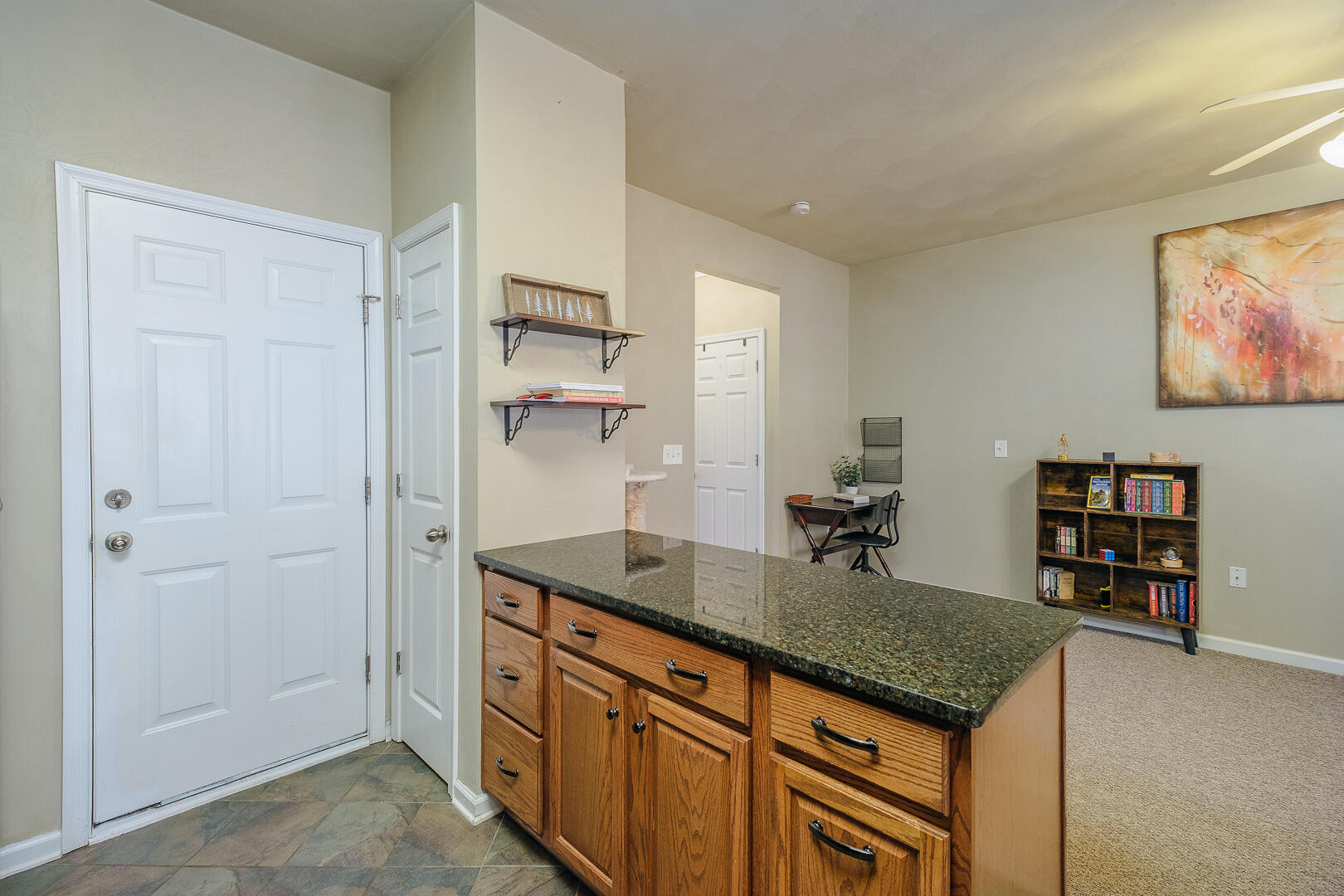 8717 Little Hoop Road Roanoke, VA 24019 - Photo 13 of 31 a kitchen with stainless steel appliances granite countertop a sink and a refrigerator