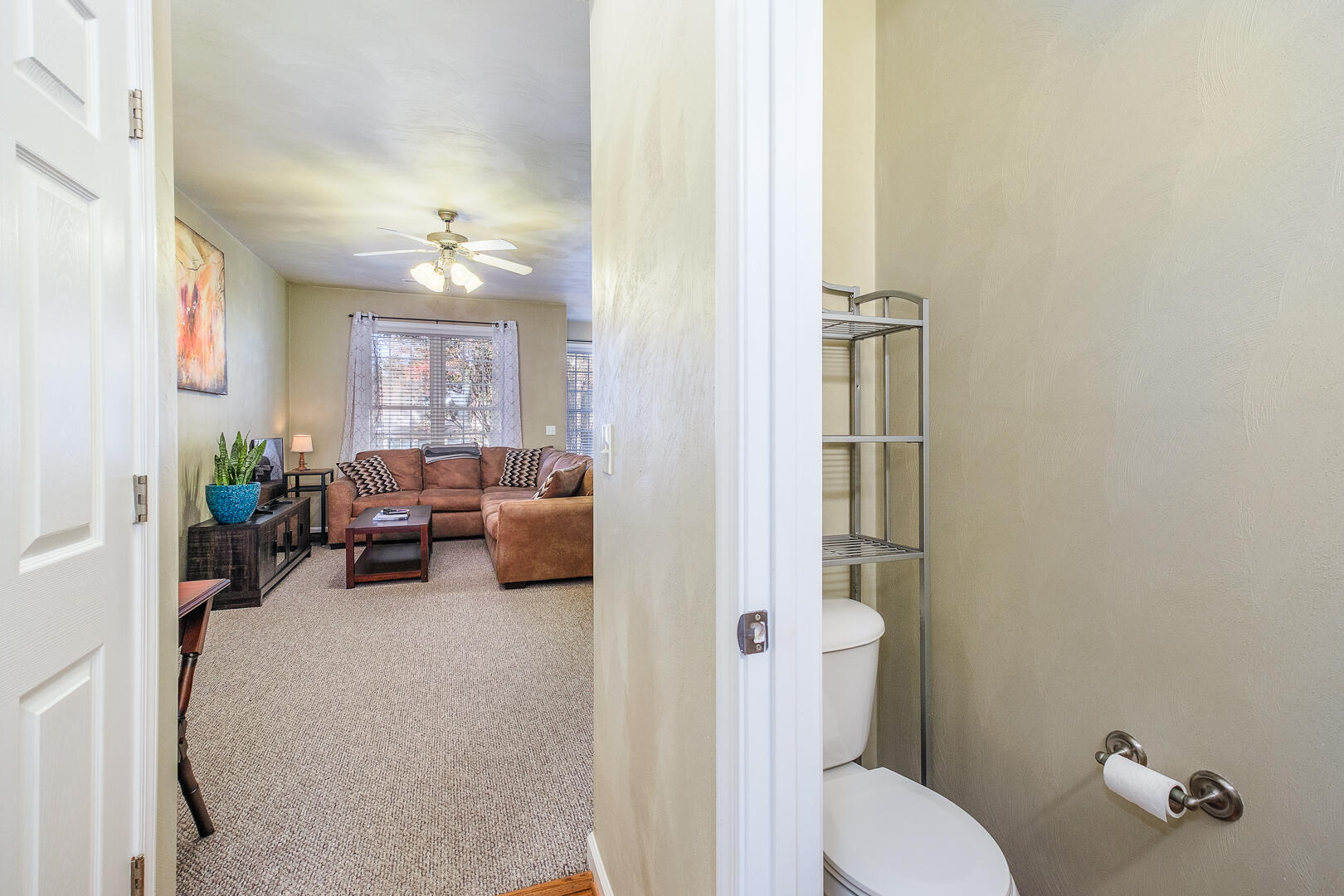 8717 Little Hoop Road Roanoke, VA 24019 - Photo 16 of 31 a bathroom with a toilet a sink and a mirror