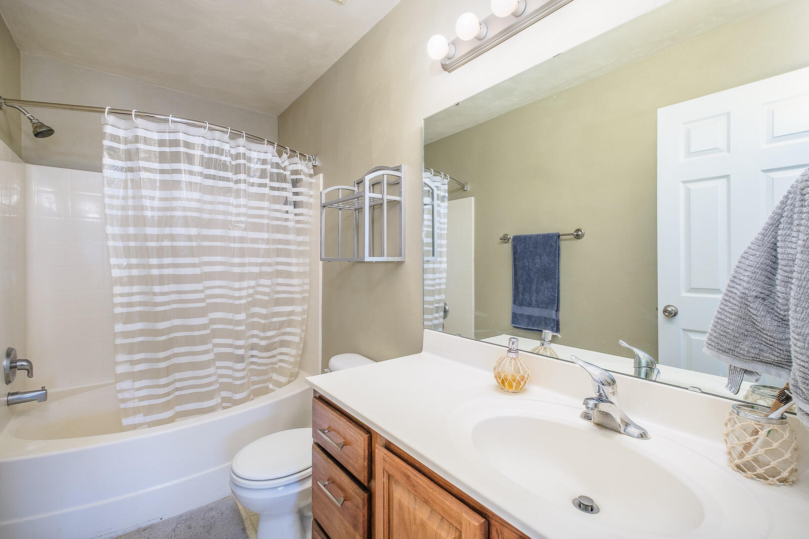 8717 Little Hoop Road Roanoke, VA 24019 - Photo 21 of 31 a bathroom with a sink toilet and shower