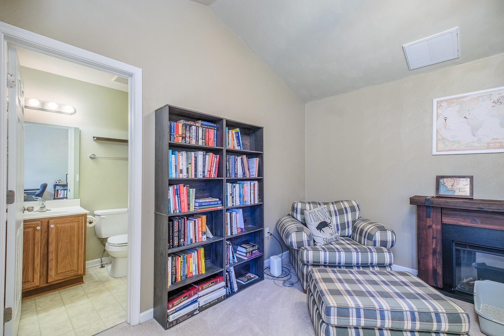 8717 Little Hoop Road Roanoke, VA 24019 - Photo 25 of 31 a bedroom with furniture and a book shelf