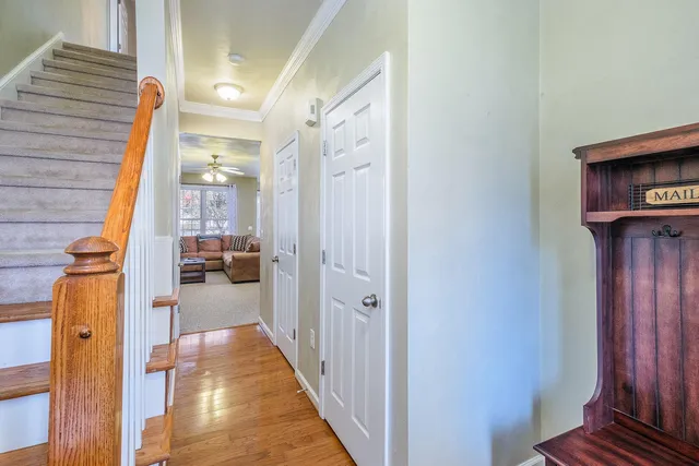 a kitchen with stainless steel appliances granite countertop a refrigerator a stove top oven a sink and dishwasher