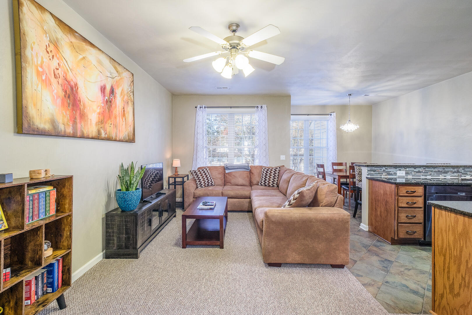 8717 Little Hoop Road Roanoke, VA 24019 - Photo 6 of 31 a living room with furniture and a book shelf