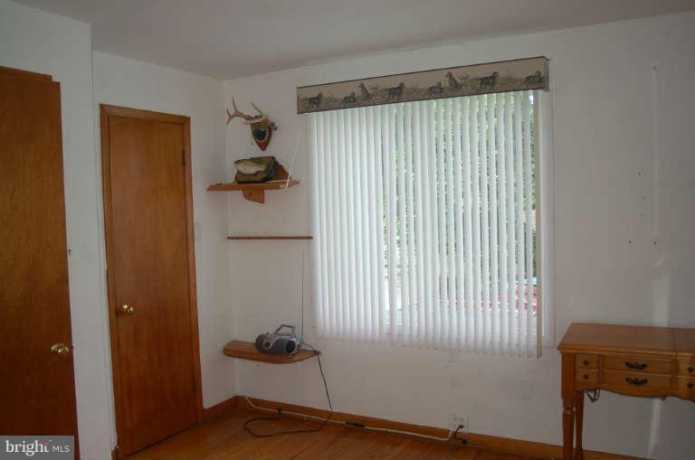 16541 Trenton Road Upperco, MD 21155 - Photo 15 of 18 a bathroom with a window and shower