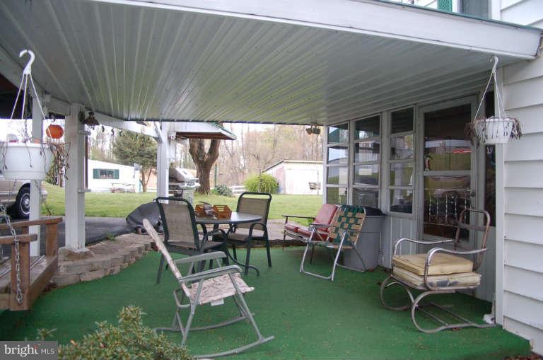 16541 Trenton Road Upperco, MD 21155 - Photo 17 of 18 a chairs and table in a patio