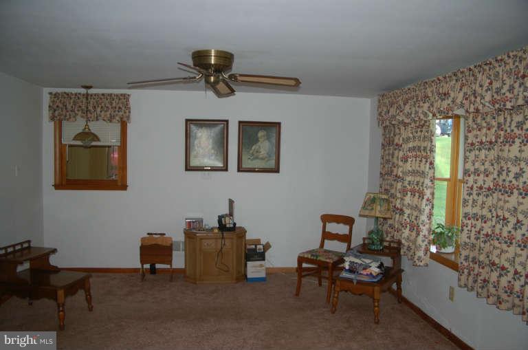 16541 Trenton Road Upperco, MD 21155 - Photo 6 of 18 a living room with furniture and a window
