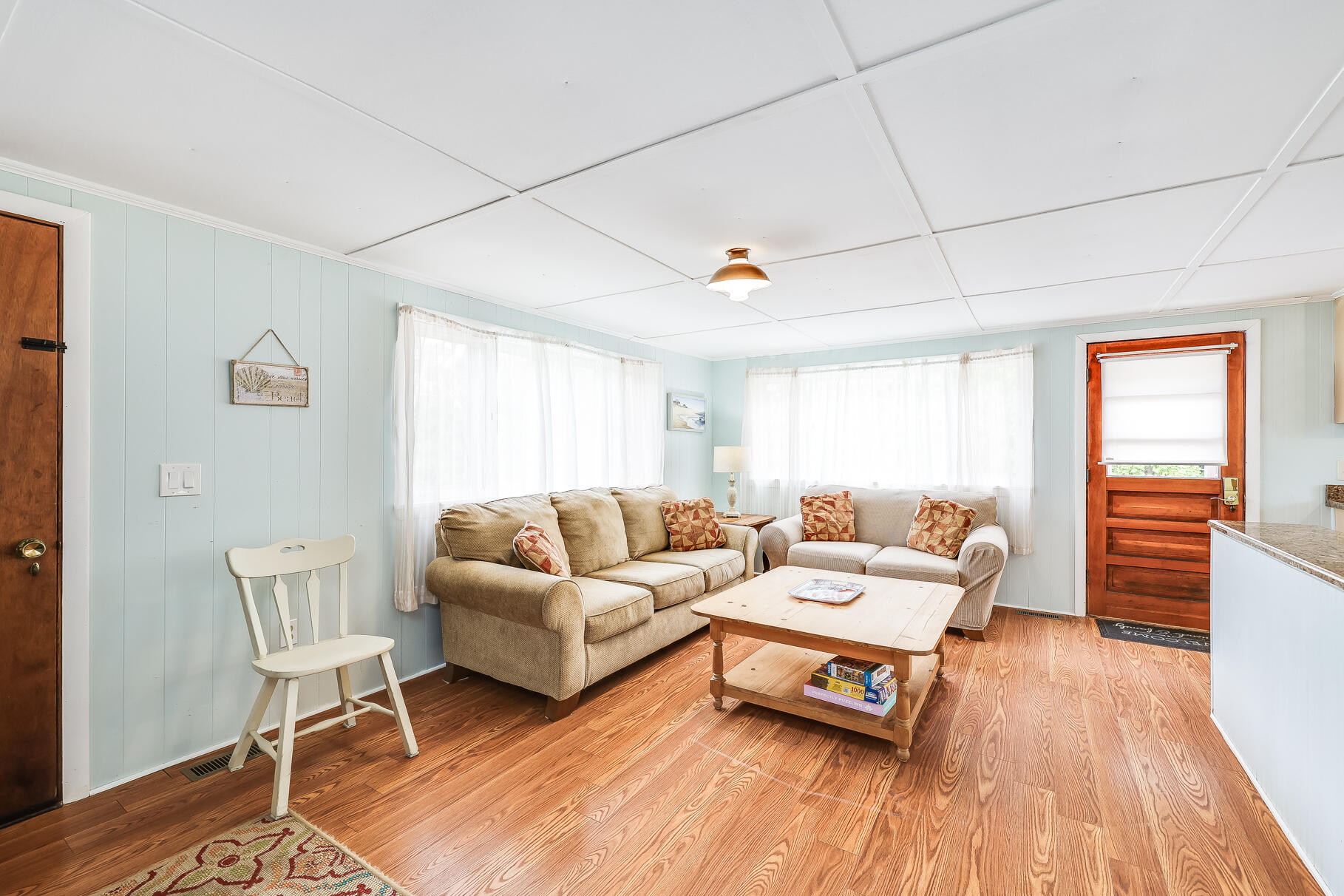 85 Boreen Road Eastham, MA 02642 - Photo 33 of 73 a living room with furniture and a wooden floor
