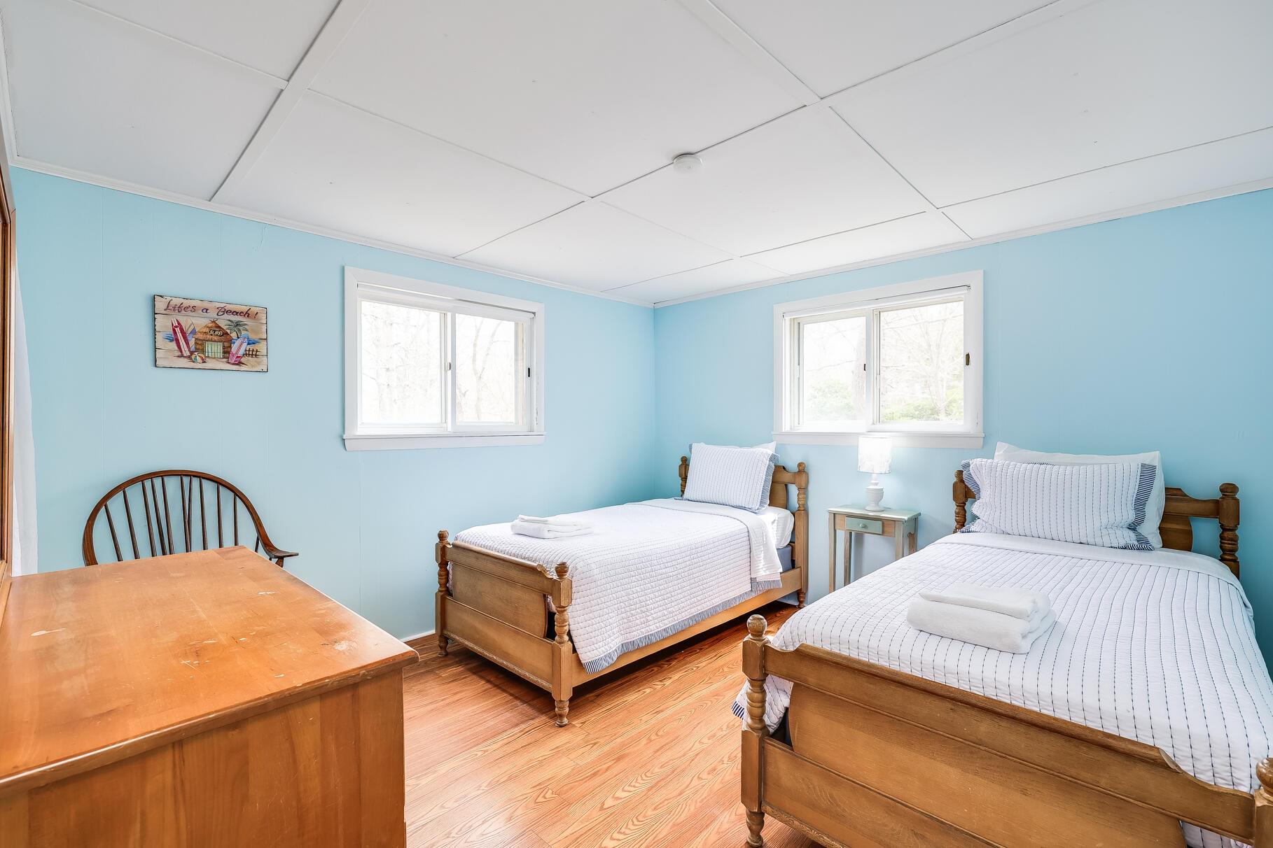 85 Boreen Road Eastham, MA 02642 - Photo 38 of 73 a bedroom with two beds and a window