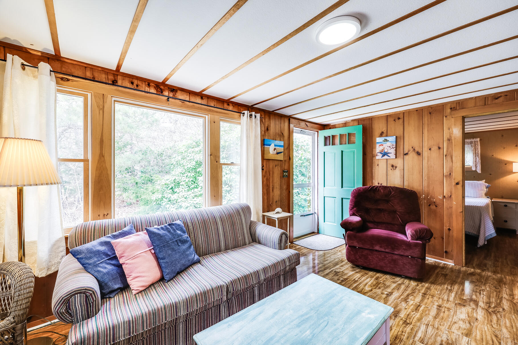 85 Boreen Road Eastham, MA 02642 - Photo 44 of 73 a living room with furniture and a large window