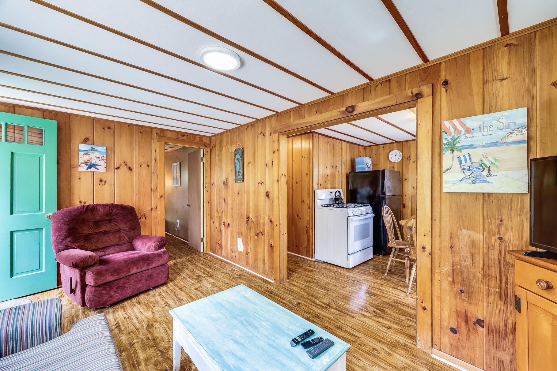 85 Boreen Road Eastham, MA 02642 - Photo 45 of 73 a living room with furniture a wooden floor and a window
