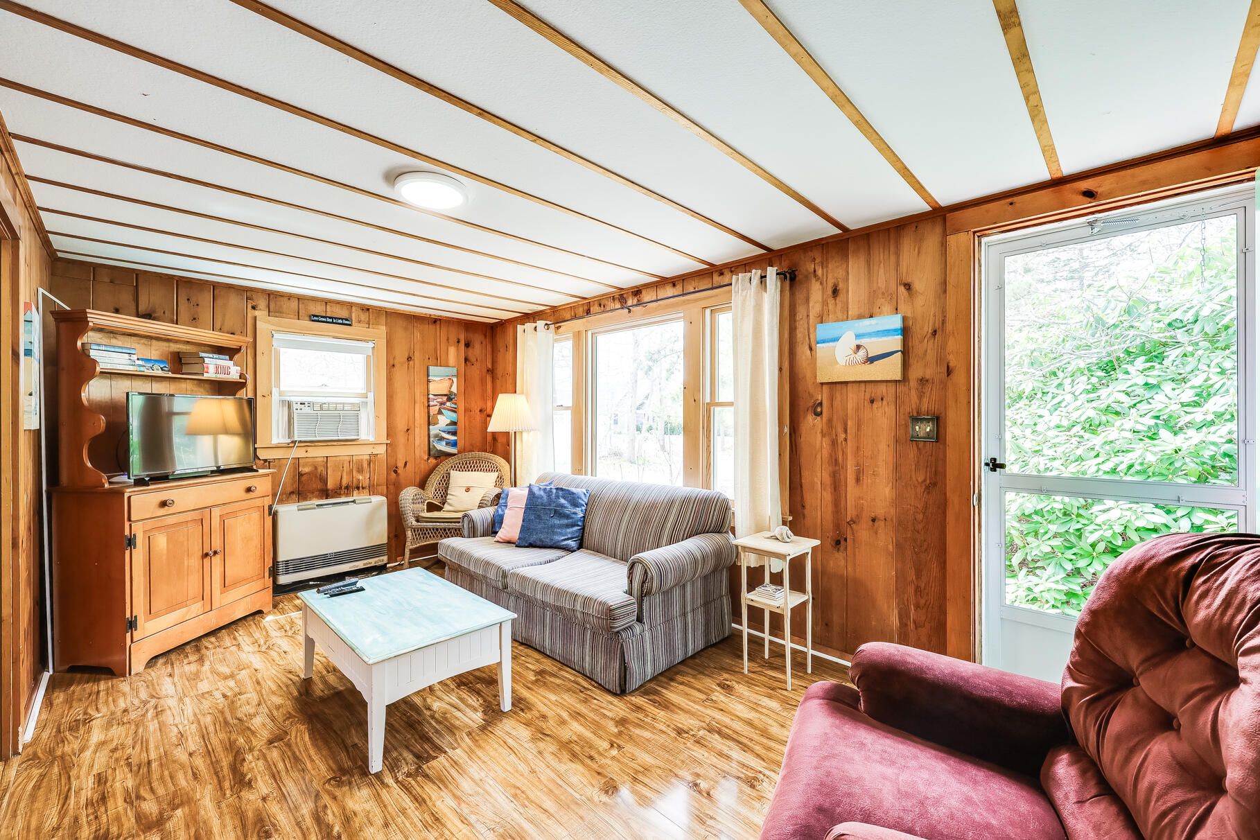 85 Boreen Road Eastham, MA 02642 - Photo 47 of 73 a living room with furniture and a large window