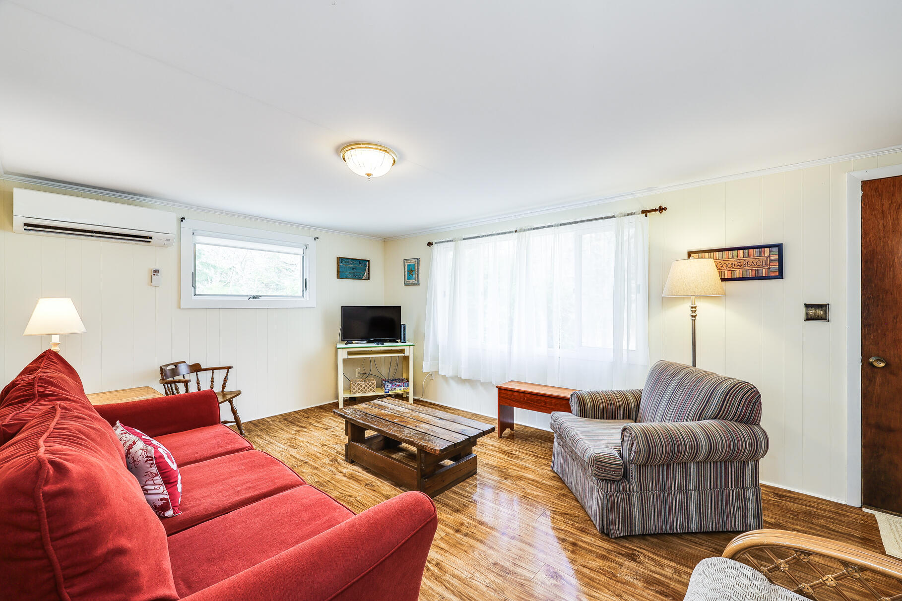 85 Boreen Road Eastham, MA 02642 - Photo 5 of 73 a living room with furniture a couch and a window