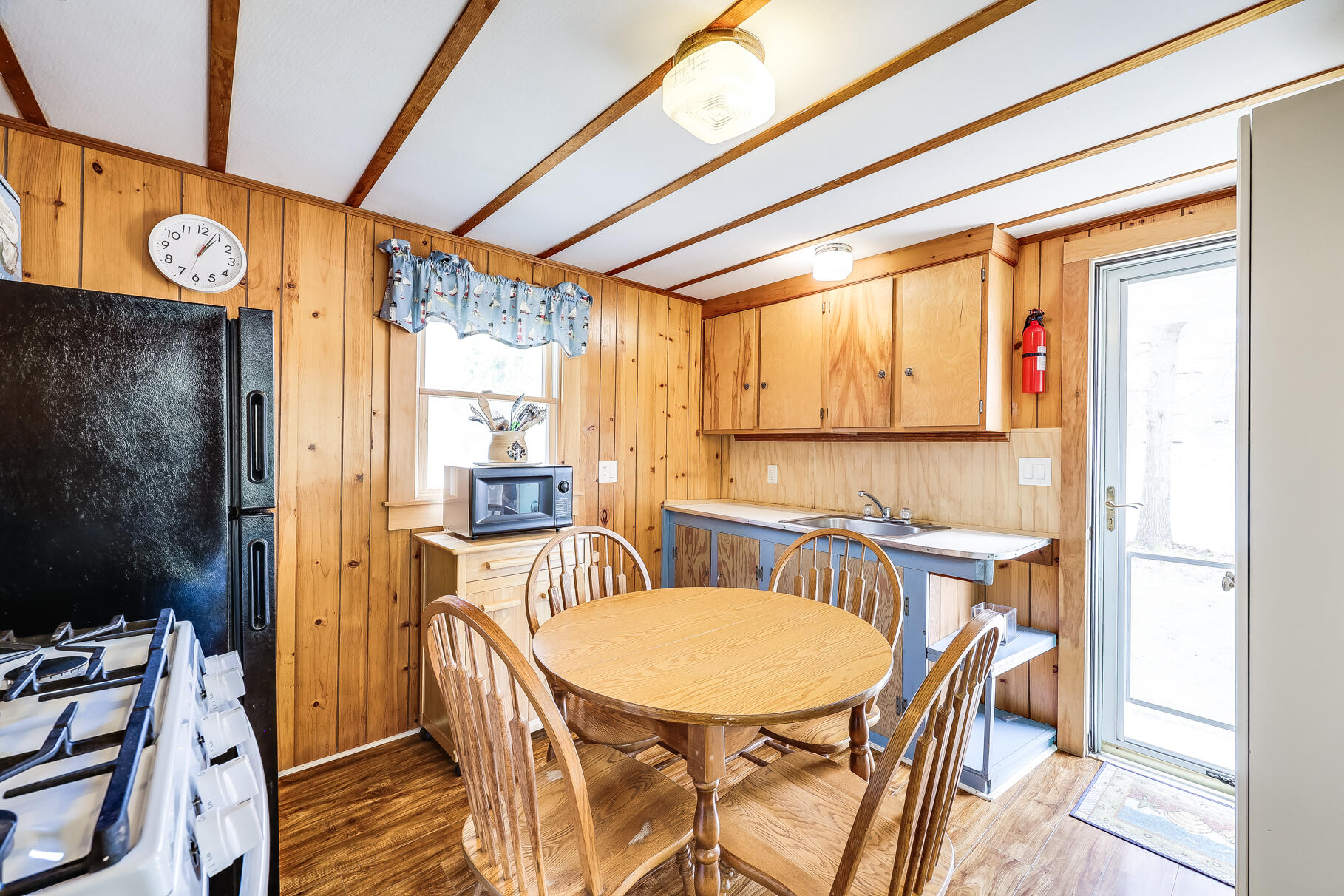 85 Boreen Road Eastham, MA 02642 - Photo 49 of 73 a view of a dining room with furniture window and outside view